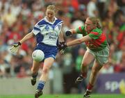 29 September 2002; Catriona Brady of Monaghan is tackled by Clare Egan of Mayo during the All-Ireland Senior Ladies Football Championship Final match between Monaghan and Mayo at Croke Park in Dublin. Photo by Ray McManus/Sportsfile