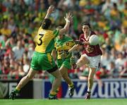 29 September 2002; Rita Kearney of Galway in action against Grace Meade of Donegal during the All-Ireland Ladies Junior Football Championship Final match between Galway and Donegal at Croke Park in Dublin. Photo by Ray McManus/Sportsfile