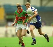 29 September 2002; Edel Byrne of Monaghan in action against Mary T Garvey of Mayo during the All-Ireland Senior Ladies Football Championship Final match between Monaghan and Mayo at Croke Park in Dublin. Photo by Damien Eagers/Sportsfile