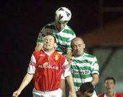 27 September 2002; Terry Palmer of Shamrock Rovers wins a high ball against his team-mate Derek Treacy and Colm Foley of St Patrick's Athletic during the eircom League Premier Division match between St. Patrick's Athletic and Shamrock Rovers at Richmond Park in Dublin. Photo by Damien Eagers/Sportsfile
