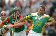 29 September 2002; Henry Kilmartin of Kilcormac / Killoughey in action against Liam Power of Birr during the Offaly County Senior Hurling Final match between Birr and Kilcormac / Kelloughey at St. Brendan's Park in Birr, Offaly. Photo by David Maher/Sportsfile