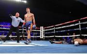 22 September 2017; Michael Conlan, left, after knocking out Kenny Guzman during their featherweight bout at the Convention Center in Tucson, Arizona. Photo by Mikey Williams/Top Rank/Sportsfile