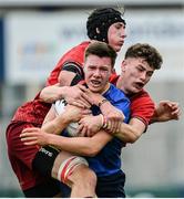 23 September 2017; Shane Murphy of Leinster is tackled by Thomas Ahern, left, and Charlie O’Doherty of Munster  during the under18 clubs interprovincial match between Leinster and Munster at Donnybrook Stadium in Dublin. Photo by Ramsey Cardy/Sportsfile
