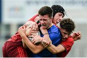 23 September 2017; Shane Murphy of Leinster is tackled by Thomas Ahern, left, and Charlie O’Doherty of Munster  during the under18 clubs interprovincial match between Leinster and Munster at Donnybrook Stadium in Dublin. Photo by Ramsey Cardy/Sportsfile