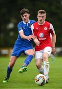 23 September 2017; Aaron Perry of Sligo Rovers in action against Jack Larkin of  Waterford FC during the SSE Airtricity National Under 17 League Mark Farren Cup Final match between Waterford FC and Sligo Rovers at RSC in Waterford. Photo by Matt Browne/Sportsfile