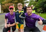 23 September 2017; Former Donegal GAA footballer, Eamon and current Donegal GAA player Jason McGee pictured along with 6 year old Aaron Doohan from Falcarragh at the Falcarragh parkrun where Vhi hosted a special event to celebrate their partnership with parkrun Ireland. Eamon was on hand to lead the warm up for parkrun participants before completing the 5km course alongside newcomers and seasoned parkrunners alike. Vhi provided walkers, joggers, runners and volunteers at Falcarragh parkrun with a variety of refreshments in the Vhi Relaxation Area at the finish line. A qualified physiotherapist was also available to guide participants through a post event stretching routine to ease those aching muscles. parkruns take place over a 5km course weekly, are free to enter and are open to all ages and abilities, providing a fun and safe environment to enjoy exercise. To register for a parkrun near you visit www.parkrun.ie. New registrants should select their chosen event as their home location. You will then receive a personal barcode which acts as your free entry to any parkrun event worldwide. Photo by Oliver McVeigh/Sportsfile