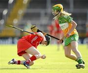 7 July 2012; Claire Shine, Cork, in action against Lorraine Keena, Offaly. All-Ireland Senior Camogie Championship, in association with RTÉ Sport, Round Three, Cork v Offaly, Pairc Ui Chaoimh, Cork. Picture credit: Stephen McCarthy / SPORTSFILE