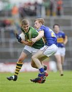 8 July 2012; Cillian Fitzgerald, Kerry, in action against Darren Cass, Tipperary. Electric Ireland Munster GAA Football Minor Championship Final, Kerry v Tipperary, Gaelic Grounds, Limerick. Picture credit: Ray McManus / SPORTSFILE
