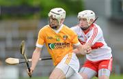 8 July 2012; Neil McManus, Antrim, in action against Paddy Henry, Derry. Ulster GAA Hurling Senior Championship Final, Antrim v Derry, Casement Park, Belfast, Co. Antrim. Picture credit: Barry Cregg / SPORTSFILE