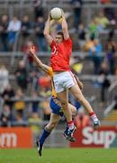 8 July 2012; Ciaran Sheehan, Cork, in action against John Hayes, Clare. Munster GAA Football Senior Championship Final, Cork v Clare, Gaelic Grounds, Limerick. Picture credit: Stephen McCarthy / SPORTSFILE