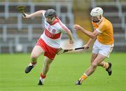 8 July 2012; Alan Grant, Derry, in action against Johnny Campbell, Antrim. Ulster GAA Hurling Senior Championship Final, Antrim v Derry, Casement Park, Belfast, Co. Antrim. Picture credit: Barry Cregg / SPORTSFILE