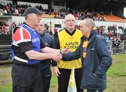 8 July 2012; Derry manager Ger Rogan, left, shake hands with Antrim manager Jim Nelson after the game the game. Ulster GAA Hurling Senior Championship Final, Antrim v Derry, Casement Park, Belfast, Co. Antrim. Picture credit: Barry Cregg / SPORTSFILE