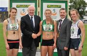 8 July 2012; Medallists in the Women's 100m Hurdles, from left, bronze medallist Elizabeth Rose, City of Lisburn AC, Antrim, gold medallist Mairead Murphy, Ferrybank AC, Waterford, and silver medallist Orla Furney, Gorey AC, Wexford, are presented with their medals by Ray Colman, 2nd left, Chief Executive, Woodies DIY and Professor Ciarán Ó Catháin, President, Athletics Ireland. Woodie’s DIY Senior Track and Field Championships of Ireland, Morton Stadium, Santry, Dublin. Picture credit: Brendan Moran / SPORTSFILE