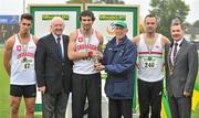 8 July 2012; Medallists in the Men's 400m, from left, bronze medallist Richard Morrissey, Havering Mayesbrook AC, gold medallist Brian Murphy, Crusaders AC, Dublin, and silver medallist Paul McKee, Beechmount Harriers AC, Belfast, Co. Antrim, are presented with their medals by Ray Colman, 2nd left, Chief Executive, Woodie's DIY, Jim McKee and Professor Ciarán Ó Catháin, President, Athletics Ireland. Woodie’s DIY Senior Track and Field Championships of Ireland, Morton Stadium, Santry, Dublin. Picture credit: Brendan Moran / SPORTSFILE