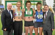 8 July 2012; Medallists in the Women's High Jump, from left, gold medallist Deirdre Ryan, Dundrum South Dublin AC, and joint silver medallists Sorcha Murphy, Ferrybank AC, Waterford, and Emily Rogers, St Peter's AC, Dundalk, Co. Louth, are presented with their medals by Ray Colman, left, Chief Executive, Woodies DIY and Professor Ciarán Ó Catháin, President, Athletics Ireland. Woodie’s DIY Senior Track and Field Championships of Ireland, Morton Stadium, Santry, Dublin. Picture credit: Brendan Moran / SPORTSFILE