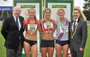 8 July 2012; Medallists in the Women's 1500m, from left, bronze medallist Kelly McNiece, City of Lisburn AC, Antrim, gold medallist Orla Drumm, UCC AC, Cork, and silver medallist Claire Tarplee, Dundrum South Dublin, are presented with their medals by Ray Colman, left, Chief Executive, Woodies DIY and Professor Ciarán Ó Catháin, President, Athletics Ireland. Woodie’s DIY Senior Track and Field Championships of Ireland, Morton Stadium, Santry, Dublin. Picture credit: Brendan Moran / SPORTSFILE