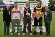 8 July 2012; Medallists in the Men's 56lb Distance, from left, bronze medallist Sean Breathnach, Galway City Harriers AC, gold medallist Tomas Rauktys, Clonliffe Harriers AC, Dublin, and Dave Tierney, Leevale AC, Cork, are presented with their medals by Ray Colman, left, Chief Executive, Woodies DIY and Professor Ciarán Ó Catháin, President, Athletics Ireland. Woodie’s DIY Senior Track and Field Championships of Ireland, Morton Stadium, Santry, Dublin. Picture credit: Brendan Moran / SPORTSFILE