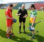 7 July 2012; Referee Aiden O'Brien with Cork captain Katriona Mackey and Offaly captain Elaine Dermody. All-Ireland Senior Camogie Championship, in association with RTÉ Sport, Round Three, Cork v Offaly, Pairc Ui Chaoimh, Cork. Picture credit: Stephen McCarthy / SPORTSFILE