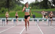 8 July 2012; Jessie Barr, Ferrybank AC, Waterford, races for the finish line on her way to winning the Women's 400m Hurdles. Woodie’s DIY Senior Track and Field Championships of Ireland, Morton Stadium, Santry, Dublin. Picture credit: Brendan Moran / SPORTSFILE