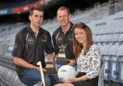 10 July 2012; Tipperary hurler Paraic Maher, left, and Sligo footballer Adrian Marren, centre, who were presented with their GAA / GPA Player of the Month Awards, sponsored by Opel, for June, by Emma O'Carroll, Marketing Assistant Opel Ireland. Croke Park, Dublin. Picture credit: Barry Cregg / SPORTSFILE