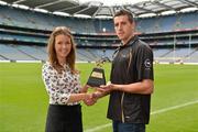 10 July 2012; Tipperary hurler Paraic Maher is presented with his GAA / GPA Player of the Month Award, sponsored by Opel, for June by Emma O'Carroll, Marketing Assistant Opel Ireland. Croke Park, Dublin. Picture credit: Barry Cregg / SPORTSFILE