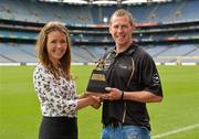 10 July 2012; Sligo footballer Adrian Marren is presented with his GAA / GPA Player of the Month Award, sponsored by Opel, for June by Emma O'Carroll, Marketing Assistant Opel Ireland. Croke Park, Dublin. Picture credit: Barry Cregg / SPORTSFILE.