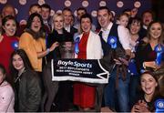 23 September 2017; The winning connections of Good News including trainer Pat Gilfoyle, centre right with blue ribbon, joint-owners Sandra Gilfoyle, holding trophy in white and red, and Mary Kennedy, centre left in yellow and black, and Jenna Boyle, Head of Retail for Boylesports, centre in black, after winning the Boylesports Irish Greyhound Derby during Boylesports Irish Greyhound Derby at Shelbourne Park in Dublin. Photo by Cody Glenn/Sportsfile