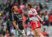 24 September 2017; Ciara McGurk of Derry celebrates scoring her side's first goal after beating Fermanagh goalkeeper Róisín Gleeson during the TG4 Ladies Football All-Ireland Junior Championship Final match between Derry and Fermanagh at Croke Park in Dublin. Photo by Cody Glenn/Sportsfile