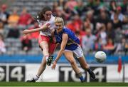 24 September 2017; Gráinne Rafferty of Tyrone scores her side's first goal despite the best efforts of Jennifer Grant of Tipperary during the TG4 Ladies Football All-Ireland Intermediate Championship Final match between Tipperary and Tyrone at Croke Park in Dublin. Photo by Brendan Moran/Sportsfile