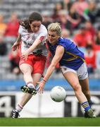 24 September 2017; Gráinne Rafferty of Tyrone scores her side's first goal despite the best efforts of Jennifer Grant of Tipperary during the TG4 Ladies Football All-Ireland Intermediate Championship Final match between Tipperary and Tyrone at Croke Park in Dublin. Photo by Brendan Moran/Sportsfile