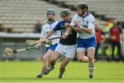 24 September 2017; Ronan O'Brien of Éire Óg Annacarty/Donohill in action against John Maher, left, and Stephen Lillis of Thurles Sarsfields during the Tipperary County Senior Club Hurling Championship semi-final match between Thurles Sarsfields and Éire Óg Annacarty/Donohill at Semple Stadium in Thurles, Tipperary. Photo by Piaras Ó Mídheach/Sportsfile