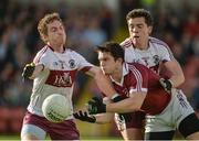 24 September 2017; Cormac O'Doherty of Slaughtneil in action against Michael McShane and Dermot McBride of Ballinascreen during the Derry County Senior Football Championship Final match between Slaughtneil and Ballinascreen at Celtic Park in Derry. Photo by Oliver McVeigh/Sportsfile