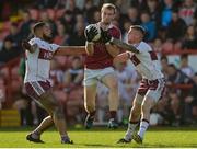 24 September 2017; Padraig Cassidy of Slaughtneil in action against Antoin Kelly and Phillip Bradley of Ballinascreen during the Derry County Senior Football Championship Final match between Slaughtneil and Ballinascreen at Celtic Park in Derry. Photo by Oliver McVeigh/Sportsfile