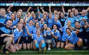 24 September 2017; Dublin players and Ollie Kearney, age 2, son of team analyst Shane Kearney celebrate with the trophy following the TG4 Ladies Football All-Ireland Senior Championship Final match between Dublin and Mayo at Croke Park in Dublin. Photo by Cody Glenn/Sportsfile