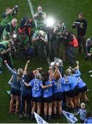 24 September 2017; Dublin players celebrate in front of photographers following the TG4 Ladies Football All-Ireland Senior Championship Final match between Dublin and Mayo at Croke Park in Dublin. Photo by Stephen McCarthy/Sportsfile