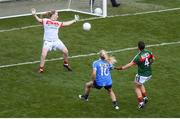 24 September 2017; Carla Rowe of Dublin shoots to score her side's third goal past Mayo goalkeeper Yvonne Byrne and Martha Carter during the TG4 Ladies Football All-Ireland Senior Championship Final match between Dublin and Mayo at Croke Park in Dublin. Photo by Stephen McCarthy/Sportsfile