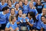 24 September 2017; Dublin players and Ollie Kearney, age 2, son of team analyst Shane Kearney celebrate with the cup following the TG4 Ladies Football All-Ireland Senior Championship Final match between Dublin and Mayo at Croke Park in Dublin. Photo by Cody Glenn/Sportsfile