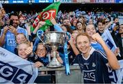 24 September 2017; Ciara Trant of Dublin celebrates with supporters and the Brendan Martin Cup following the TG4 Ladies Football All-Ireland Senior Championship Final match between Dublin and Mayo at Croke Park in Dublin. Photo by Cody Glenn/Sportsfile