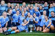 24 September 2017; Dublin players and Ollie Kearney, age 2, son of team analyst Shane Kearney celebrate with the Brendan Martin Cup following the TG4 Ladies Football All-Ireland Senior Championship Final match between Dublin and Mayo at Croke Park in Dublin. Photo by Cody Glenn/Sportsfile