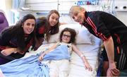 25 September 2017; Sadhbh McGrath, age 5, from Raheny, Co Dublin, meets Mayo senior ladies footballers Noirín Moran, Sarah Tierney, and Marie Corbett during the All-Ireland Senior Ladies Football Champions visit to Temple Street Children's Hospital at Temple Street Children’s Hospital, in Dublin. Photo by Cody Glenn/Sportsfile