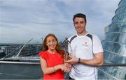 26 September 2017; Marie Coady, Tax Partner PwC, presents Galway hurler Conor Cooney with his PwC GAA/GPA Player of the Month Award for July at a reception in PwC Offices, Dublin. Photo by Sam Barnes/Sportsfile