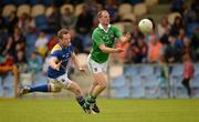 14 July 2012; Lorcan O'Dwyer, Limerick, in action against Sean McCormack, Longford. GAA Football All-Ireland Senior Championship Qualifier, Round 2, Longford v Limerick, Glennon Brothers Pearse Park, Longford. Picture credit: Ray McManus / SPORTSFILE