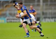 14 July 2012; Philip Austin, Tipperary, in action against Aindreas Doyle, Wexford. GAA Football All-Ireland Senior Championship Qualifier, Round 2, Tipperary v Wexford, Semple Stadium, Thurles, Co. Tipperary. Picture credit: Matt Browne / SPORTSFILE