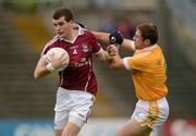 14 July 2012; Johnny Duane, Galway, in action against Tony Scullion, Antrim. GAA Football All-Ireland Senior Championship Qualifier, Round 2, Antrim v Galway, Casement Park, Belfast, Co. Antrim. Picture credit: Oliver McVeigh / SPORTSFILE