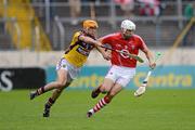 14 July 2012; Pa Cronin, Cork, in action against Eoin Quigley, Wexford. GAA Hurling All-Ireland Senior Championship, Phase 3, Wexford v Cork, Semple Stadium, Thurles, Co. Tipperary. Picture credit: Stephen McCarthy / SPORTSFILE