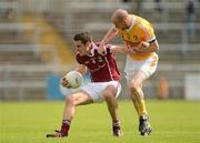 14 July 2012; Fiontain O'Curraoin, Galway, in action against Aodhan Gallagher, Antrim. GAA Football All-Ireland Senior Championship Qualifier, Round 2, Antrim v Galway, Casement Park, Belfast, Co. Antrim. Picture credit: Oliver McVeigh / SPORTSFILE