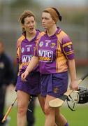 14 July 2012; Wexford's Kate Kelly and Ursula Jacob, right, show their disappointment after the game. All-Ireland Senior Camogie Championship Round Four, in association with RTÉ Sport, Galway v Wexford, Kenny Park, Athenry, Co. Galway. Picture credit: Pat Murphy / SPORTSFILE