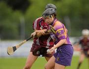 14 July 2012; Ursula Jacob, Wexford, in action against Sinead Cahalan, Galway. All-Ireland Senior Camogie Championship Round Four, in association with RTÉ Sport, Galway v Wexford, Kenny Park, Athenry, Co. Galway. Picture credit: Pat Murphy / SPORTSFILE