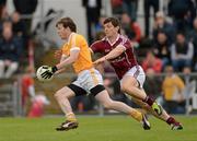 14 July 2012; Justin Crozier, Antrim, in action against Michael Meehan, Galway. GAA Football All-Ireland Senior Championship Qualifier, Round 2, Antrim v Galway, Casement Park, Belfast, Co. Antrim. Picture credit: Oliver McVeigh / SPORTSFILE