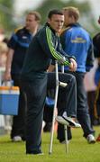 14 July 2012; An injured Leighton Glynn, Wicklow, looks on at his team-mates warming up before the game. GAA Football All-Ireland Senior Championship Qualifier, Round 2, Leitrim v Wicklow, Sean McDermott Park, Carrick-on-Shannon, Co. Leitrim. Picture credit: Barry Cregg / SPORTSFILE